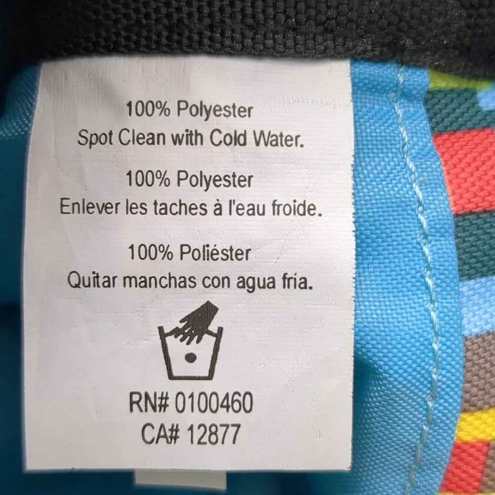 Kavu Keeper Crossbody Bag Geometric Teal Yellow Red